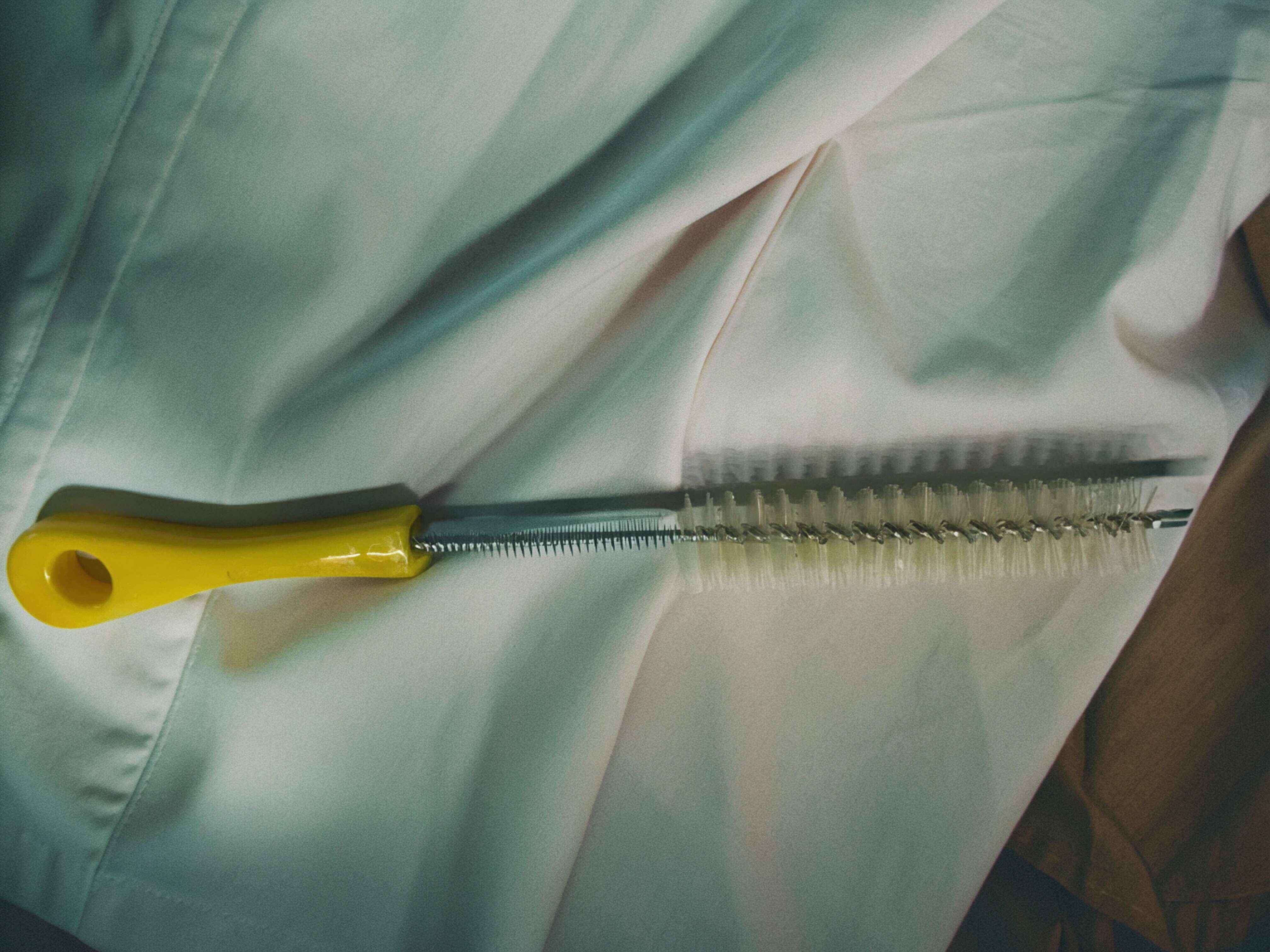 An actual YC Brushes custom bottle brush